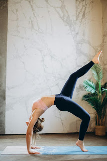 Woman doing advanced yoga