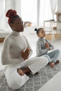 Yoga Poses for Stress Relief : Simple yoga poses being performed in an office setting for stress relief and improved focus.
