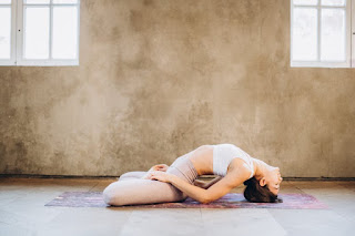 Supported Fish Pose for heart opening and emotional healing