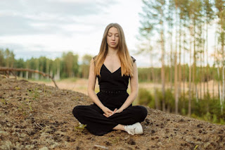 Zen meditation (Zazen) practitioner in traditional sitting pose