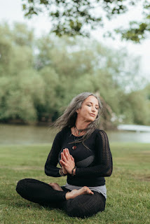 Individual experiencing guided meditation through visualization.