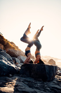 Engaging in daily activities mindfully, like mindful eating, walking, and complex yoga poses. This image showcases how to incorporate mindfulness into daily routines such yoga, demonstrating practical applications of mindfulness techniques in everyday life.