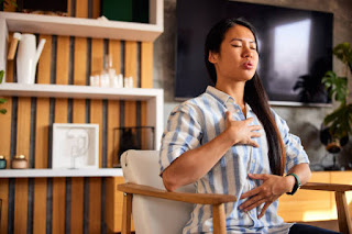 Person practicing Ujjayi Breath to enhance breath awareness and emotional balance.