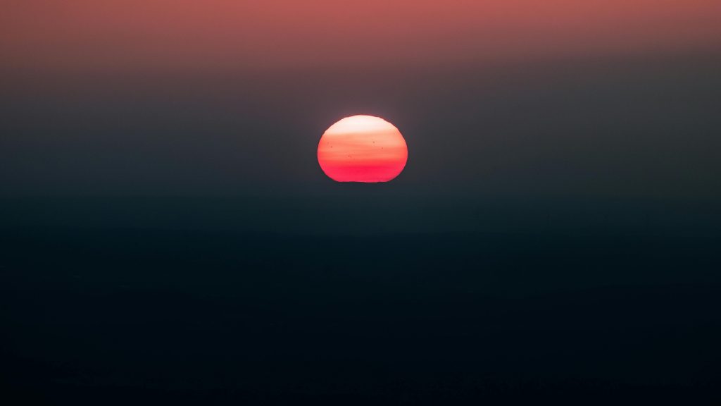 Morning Sun or Evening sun, stretch at sunrise and evening. Odd sun picture illustrating hybrid yoga routines for balanced energy.
