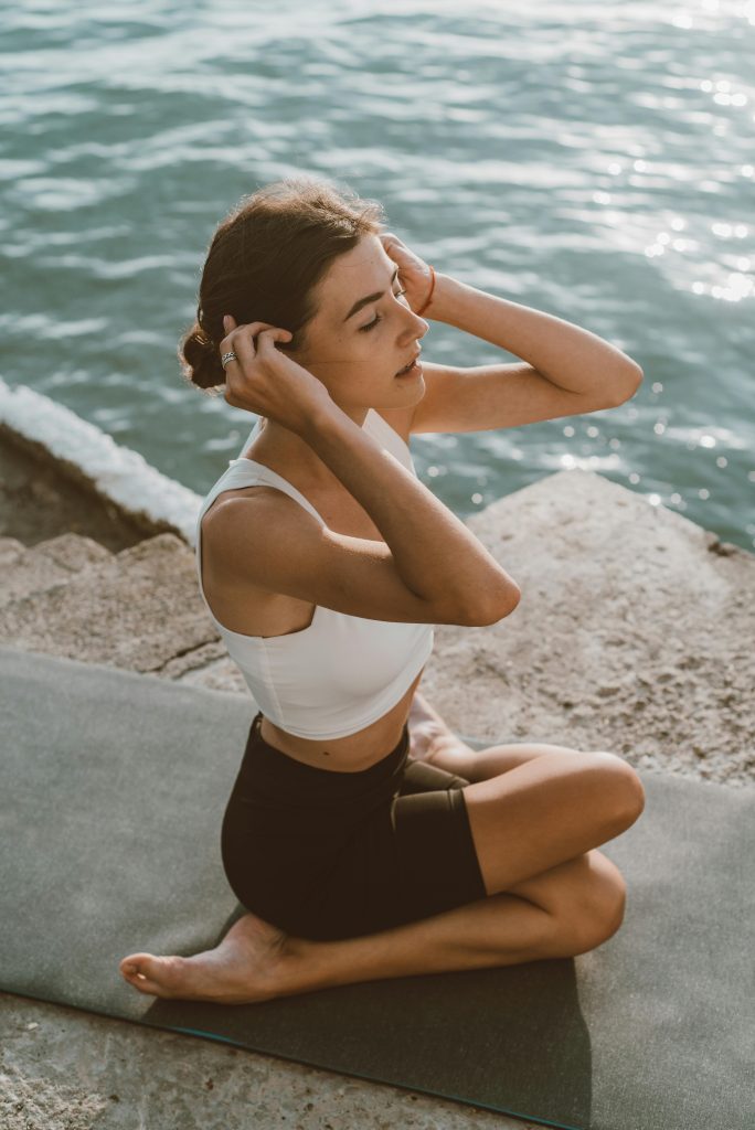 Stressed person facing multiple tasks, showing how willpower alone can fail.
